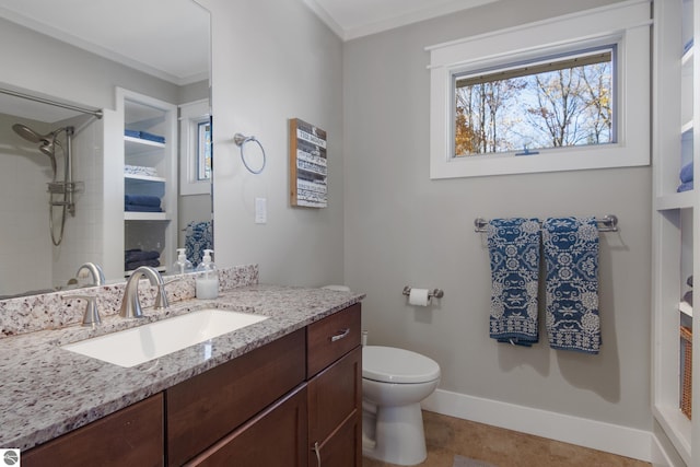 bathroom with a tile shower, toilet, vanity, crown molding, and tile patterned floors