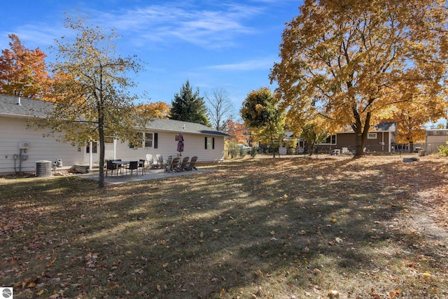 view of yard featuring a patio area and cooling unit