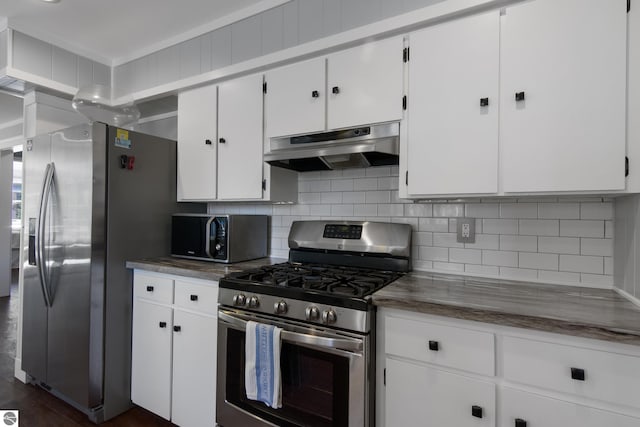 kitchen with white cabinetry, backsplash, stainless steel appliances, and dark hardwood / wood-style flooring