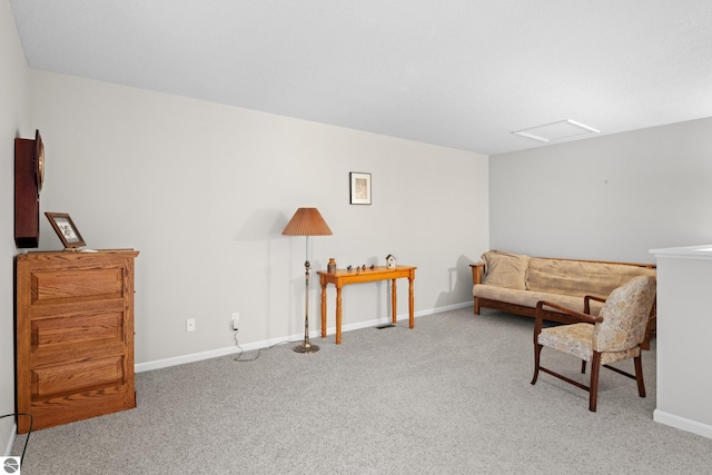 living area with carpet flooring