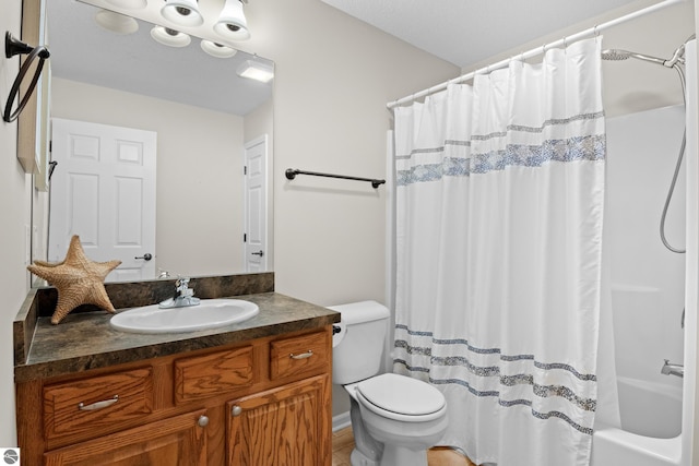 full bathroom with vanity, toilet, and shower / bathtub combination with curtain