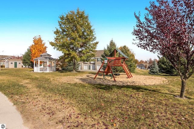 view of play area featuring a gazebo and a lawn