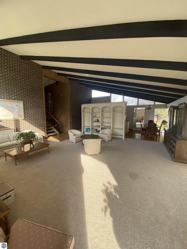 616 Holiday Dr, Bellaire, MI 49615 - below grade area with carpet flooring and stairs
