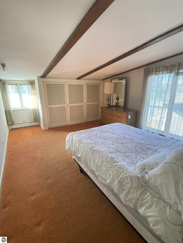 616 Holiday Dr, Bellaire, MI 49615 - bedroom featuring light carpet, vaulted ceiling, and a baseboard heating unit