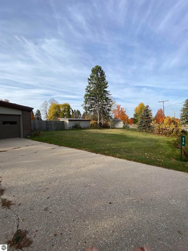 view of yard with a garage