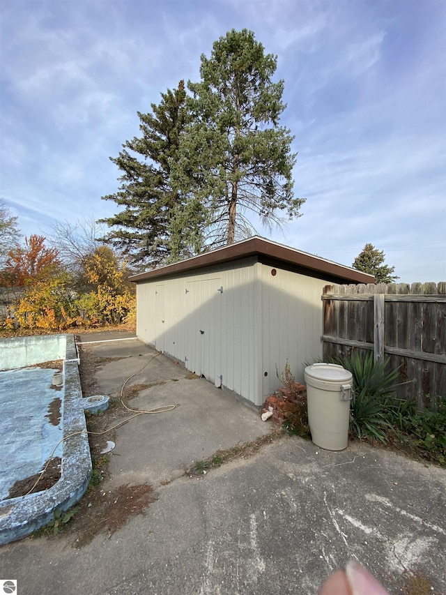 616 Holiday Dr, Bellaire, MI 49615 - view of outbuilding with fence and an outbuilding