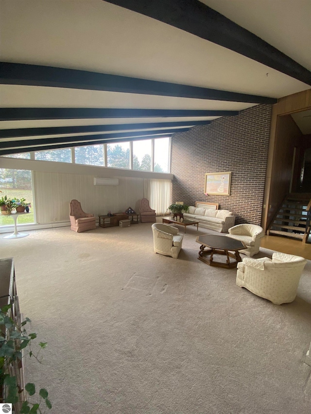 unfurnished living room featuring lofted ceiling with beams and carpet flooring