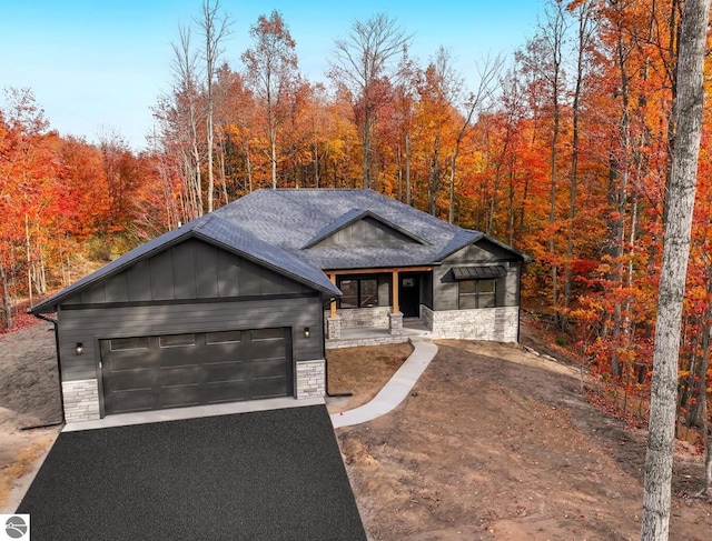 view of front of property featuring a garage