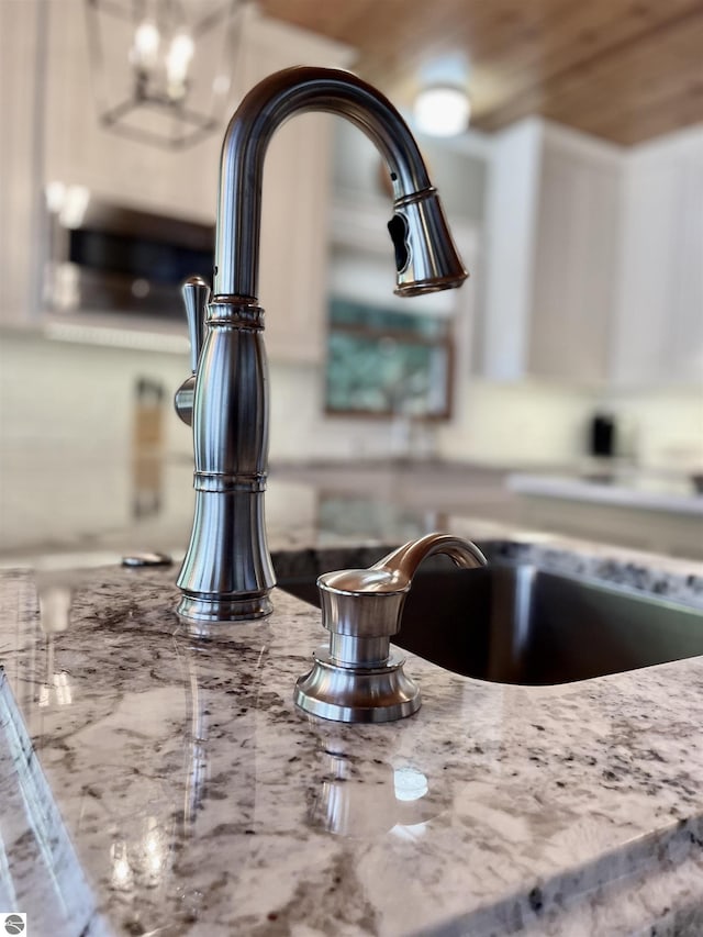 11320 Shippey Ln, Rapid City, MI 49676 - details with light stone counters