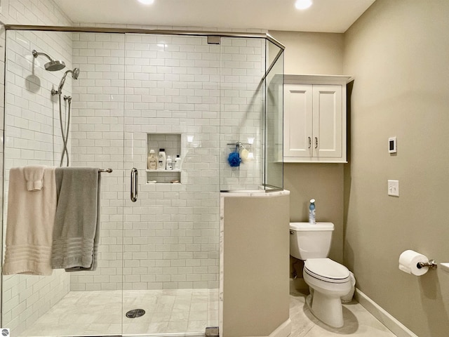11320 Shippey Ln, Rapid City, MI 49676 - full bath featuring toilet, baseboards, recessed lighting, and a stall shower