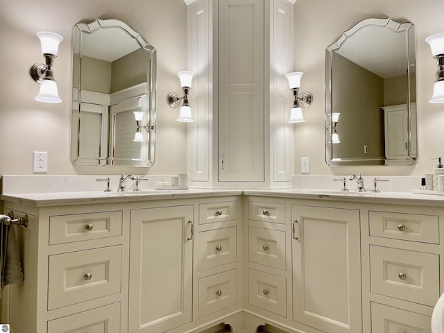 11320 Shippey Ln, Rapid City, MI 49676 - full bathroom with double vanity and a sink