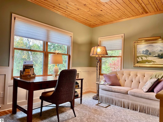 office space with wood ceiling, wood-type flooring, a wealth of natural light, and ornamental molding