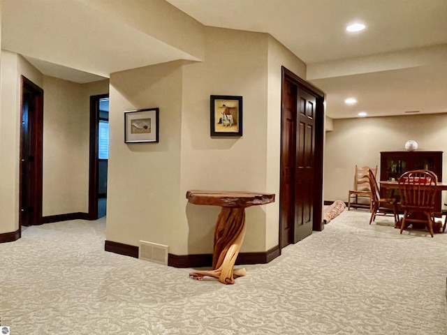 11320 Shippey Ln, Rapid City, MI 49676 - hall with recessed lighting, baseboards, visible vents, and carpet