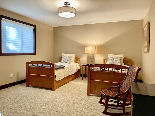 11320 Shippey Ln, Rapid City, MI 49676 - bedroom featuring baseboards and carpet