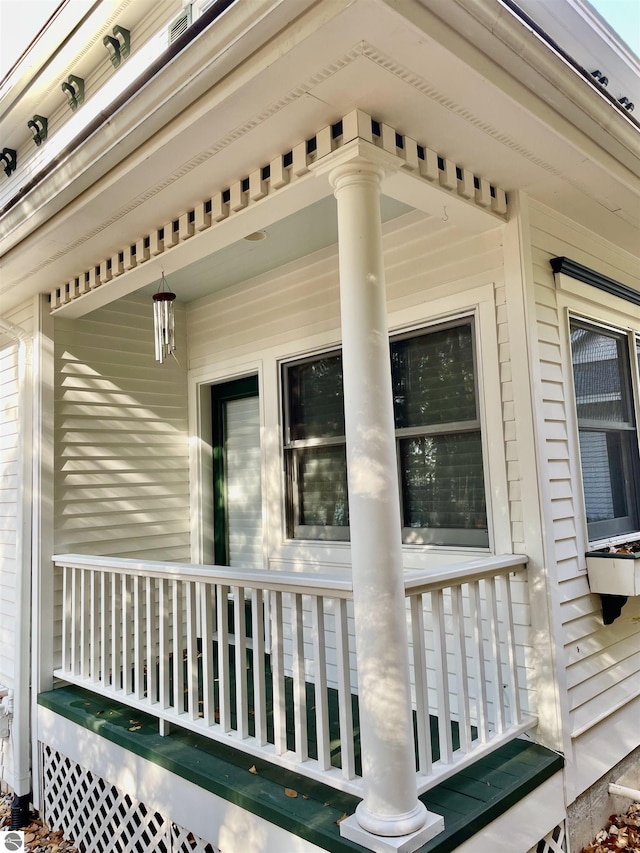 11320 Shippey Ln, Rapid City, MI 49676 - view of side of home featuring a porch