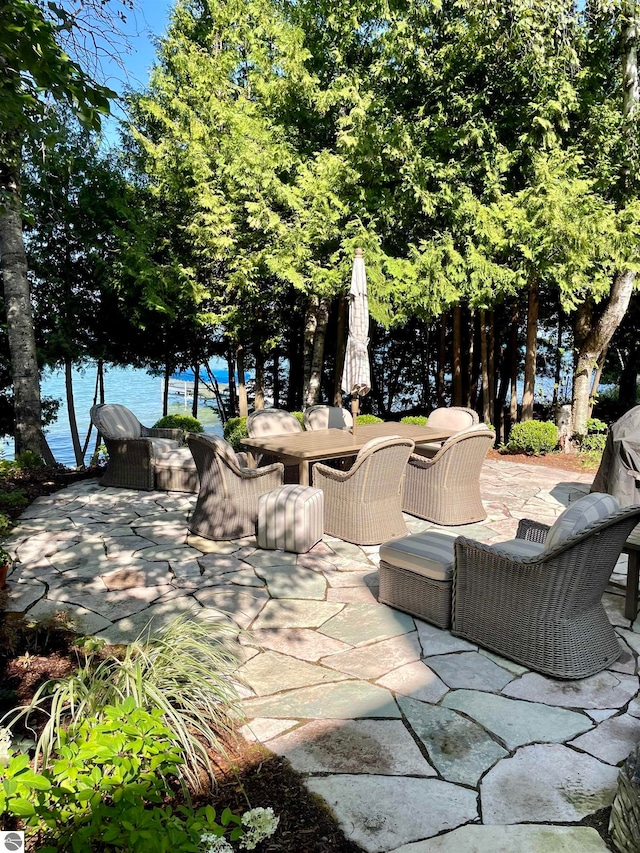 view of patio featuring a water view