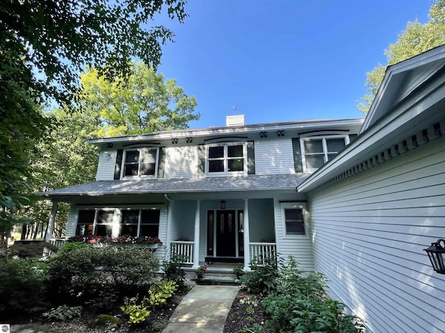 11320 Shippey Ln, Rapid City, MI 49676 - entrance to property featuring covered porch