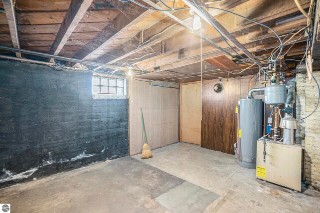 basement featuring gas water heater