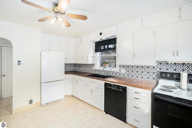 kitchen featuring white cabinets, black dishwasher, range with electric cooktop, and white refrigerator