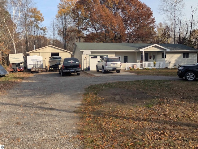 view of front of house with a garage and a porch