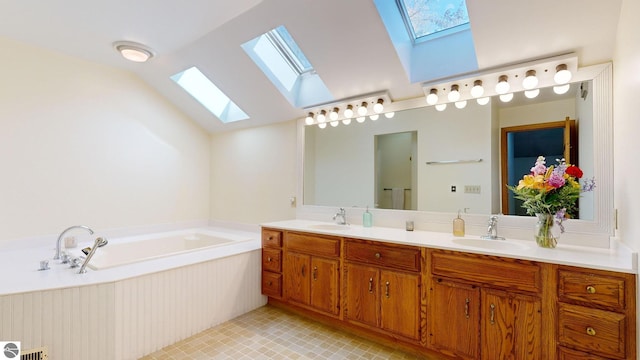 bathroom featuring vanity, a tub to relax in, and lofted ceiling