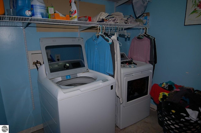 laundry area featuring washing machine and dryer