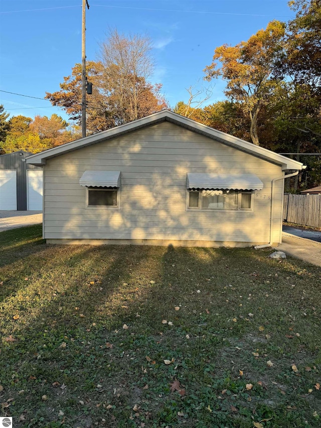 view of home's exterior featuring a lawn