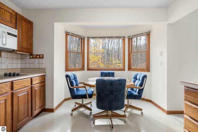 dining space featuring plenty of natural light