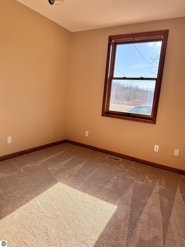 empty room with carpet floors