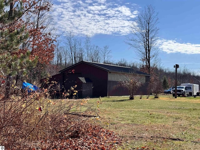 exterior space with an outbuilding