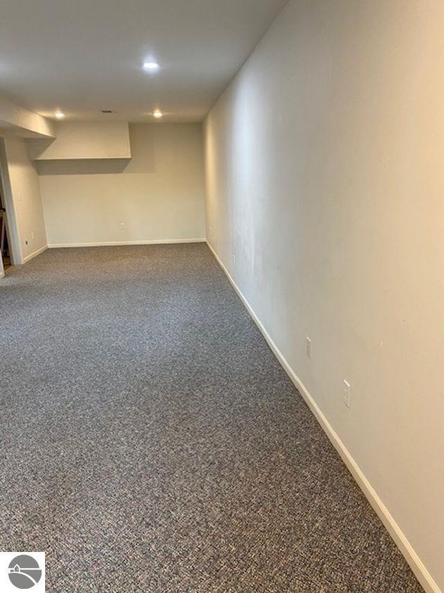 4709 State Park Hwy, Interlochen, MI 49643 - finished below grade area featuring carpet floors, recessed lighting, and baseboards
