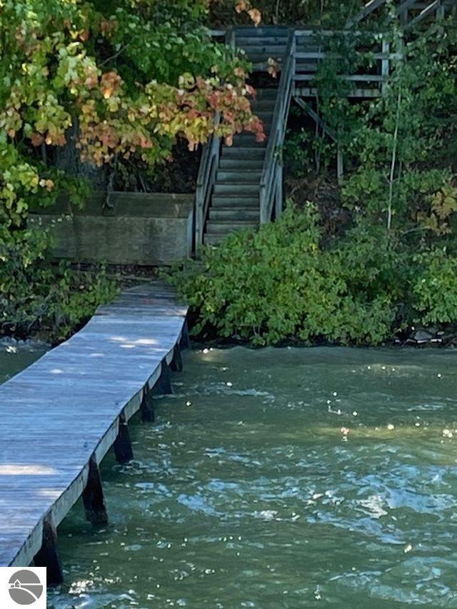 4709 State Park Hwy, Interlochen, MI 49643 - dock area featuring stairway