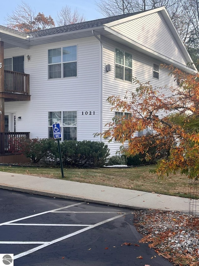 view of property exterior with a balcony