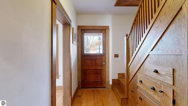 doorway featuring light hardwood / wood-style floors