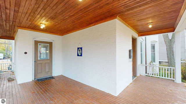 doorway to property featuring a porch