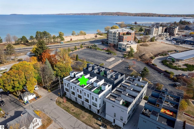 bird's eye view with a water view