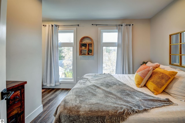 bedroom featuring dark hardwood / wood-style floors