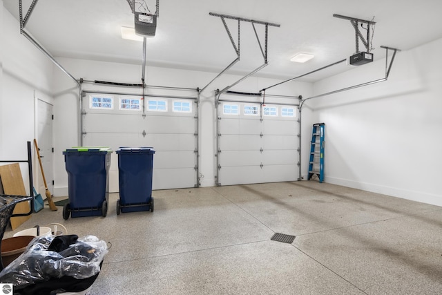 garage featuring a garage door opener