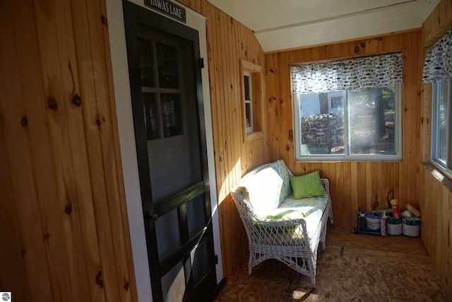 sunroom / solarium with vaulted ceiling