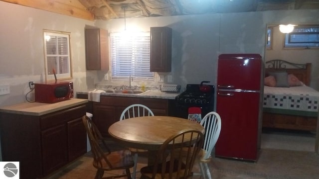 kitchen with sink and refrigerator