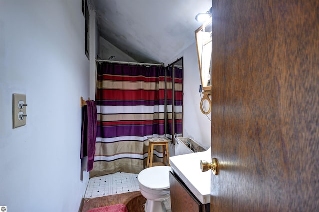 2489 Main Ave, Traverse City, MI 49696 - full bath featuring lofted ceiling, curtained shower, toilet, and vanity