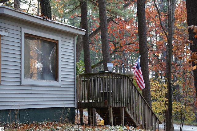 view of home's exterior featuring a deck