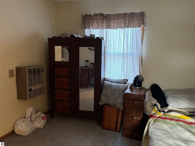 bedroom featuring light colored carpet