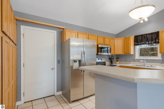 kitchen featuring stainless steel appliances, sink, light tile patterned floors, pendant lighting, and vaulted ceiling