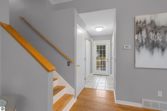 entrance foyer featuring light wood-type flooring