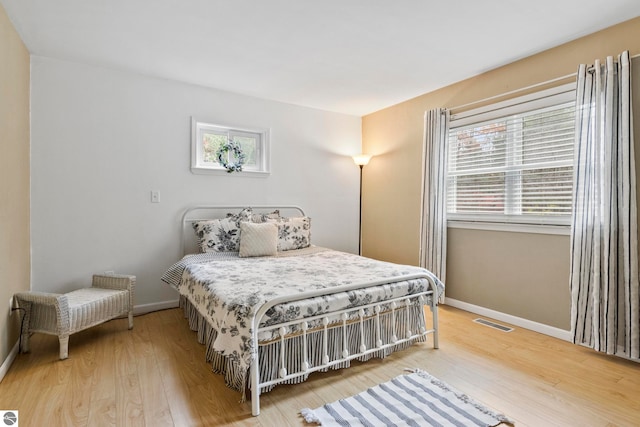 bedroom featuring wood-type flooring