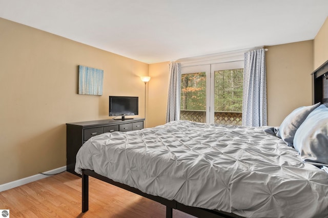 bedroom featuring light wood-type flooring