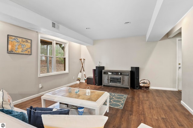 living room featuring dark hardwood / wood-style floors