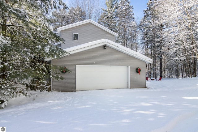 exterior space with a garage