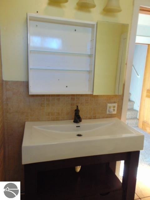 bathroom featuring tile patterned floors and vanity